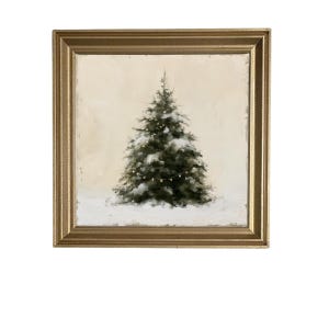 May include: A square framed painting featuring a dark green Christmas tree covered in light snow and small yellow lights. The tree stands in a snowy landscape against a neutral beige background. The frame is a metallic gold with a beveled edge.