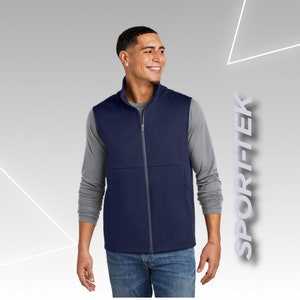 May include: A navy blue fleece vest with a zipper closure. The vest has a stand-up collar and two pockets.
