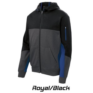 May include: A black and gray hooded sweatshirt with blue accents. The sweatshirt has a zipper closure and a pocket on the front. The text "Royal/Black" is printed below the image.