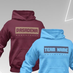 May include: Two hooded sweatshirts, one maroon with "PASADENA BASKETBALL" printed on the front, and one light blue with "TEAM NAME VOLLEYBALL" printed on the front.