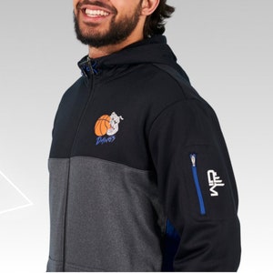 May include: A black and gray zippered hoodie with a basketball and the word "Dinosaurs" on the front. The hoodie has a blue zipper and a blue zippered pocket on the right sleeve. The text "NFL" is on the pocket.