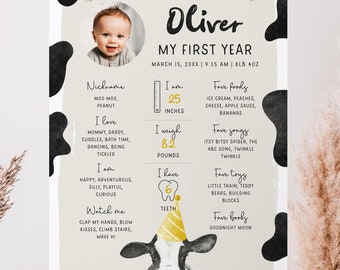 May include: A black and white cow with a yellow party hat is on a light brown background. The cow is surrounded by black and white spots. The text "Oliver, My First Year" is at the top of the page. The text "March 15, 20XX | 9:35 AM | 8LB 40Z" is below the title. The page is divided into sections with information about Oliver's first year, including his nickname, favorite foods, songs, toys, and books. The page also includes information about Oliver's height, weight, and number of teeth.