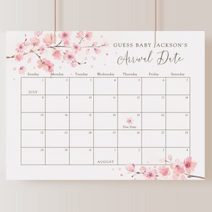 May include: A printable baby shower game with a pink floral design. The game asks guests to guess the baby's arrival date on a calendar with a due date marked. The text reads "Guess Baby Jackson's Arrival Date".