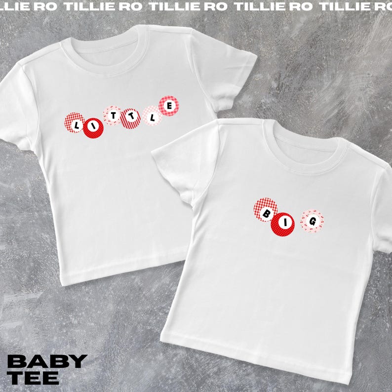 May include: Two white baby tees with the words "LITTLE" and "BIG" spelled out in red and white patterned circles. The text "BABY TEE" is at the bottom of the image. The background is a gray surface.
