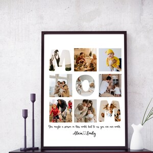 May include: A white framed collage with nine photos of a family. The photos are arranged in the shape of the word "MOM". The text "You maybe a person in this world but to us you are our world" is below the photos. The names "Alicia" and "Emily" are written below the text.