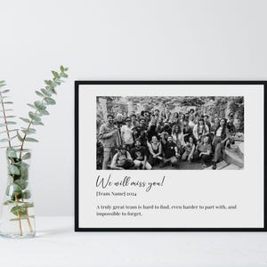 May include: A black and white photo of a group of people standing together. The photo is framed in a black frame and has the text "We will miss you!" and "[Team Name] 2014" below the photo. The text below the photo reads "A truly great team is hard to find, even harder to part with, and impossible to forget."