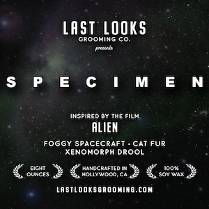 May include: An advertisement with a space background. The text reads "LAST LOOKS GROOMING CO. presents SPECIMEN." It is "INSPIRED BY THE FILM ALIEN." Features include "FOGGY SPACECRAFT, CAT FUR, XENOMORPH DROOL." Contains "EIGHT OUNCES" and is "HANDCRAFTED IN HOLLYWOOD, CA."