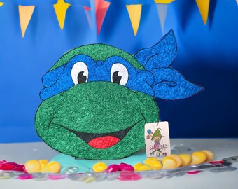 Piñata éco responsable de tortue ninja fait de carton recyclé et papier de soie certifié FSC pour décoration fête