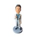 Custom Bobbleheads,bobbleheads doctor,bobbleheads custom,doctor graduation,graduation 2020,polymer clay,stethoscope with clipboard,gifts 