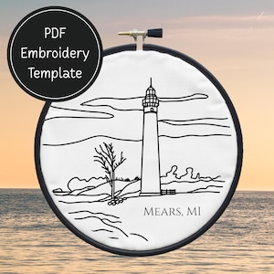 May include: Black and white embroidery hoop featuring a lighthouse scene with the text "MEARS, MI". The design includes a lighthouse, tree, and shoreline. The top left corner has a black circle with the text "PDF Embroidery Template".