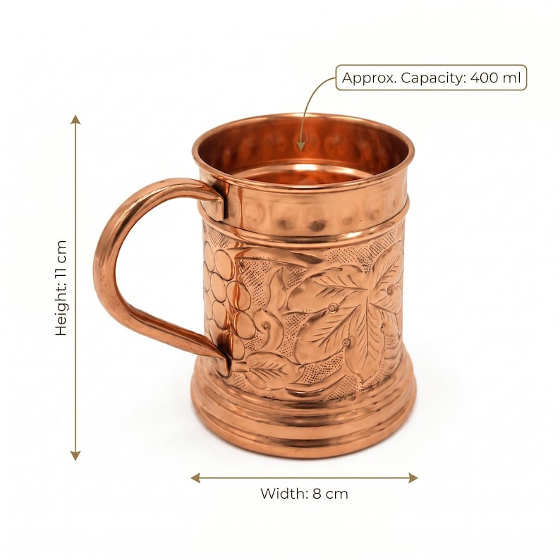 May include: A copper mug with a curved handle, featuring an embossed grape and leaf pattern on the exterior. The mug has a height of 11 cm, a width of 8 cm, and an approximate capacity of 400 ml as indicated by the text labels in the image.