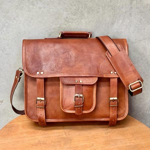 15'' puur leren laptoptas | gewatteerde laptopvakken | verstelbare bandjes | YKK-ritsen | uniseks