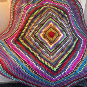 Multi color crochet granny square throw measures 51 inches square (4ft, 3 inches).