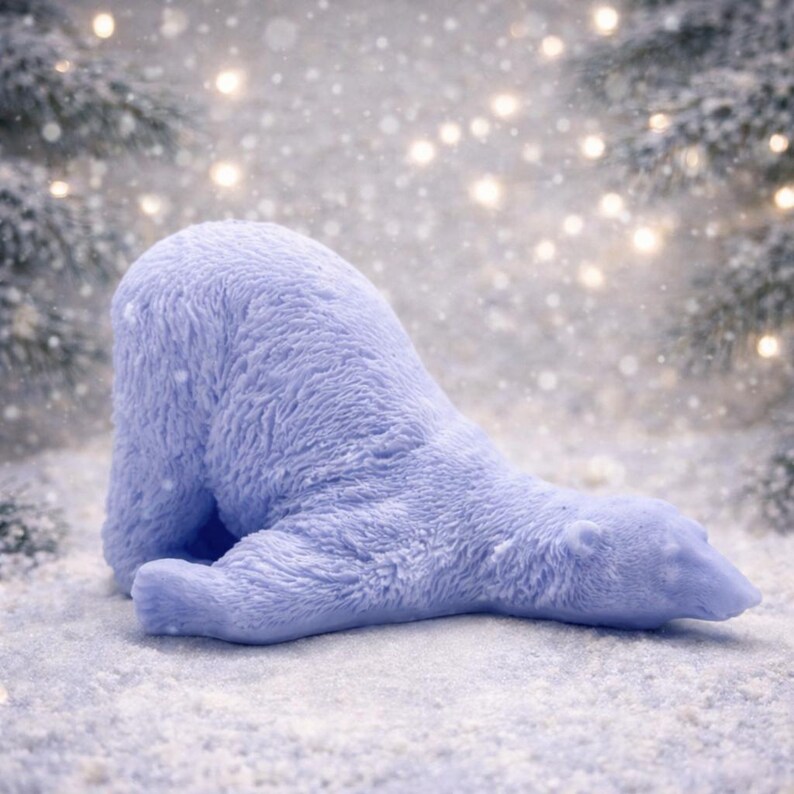 huge highly detailed polar bear shaped vegan bar soap, handmade and resting on a rustic wooden table with floral backdrop - ideal sustainable gift idea for animal lovers.