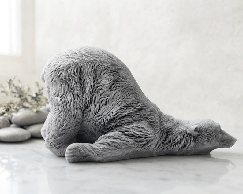 huge highly detailed polar bear shaped vegan bar soap, handmade and resting on a rustic wooden table with floral backdrop - ideal sustainable gift idea for animal lovers.