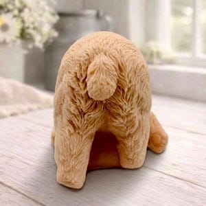 huge highly detailed polar bear shaped vegan bar soap, handmade and resting on a rustic wooden table with floral backdrop - ideal sustainable gift idea for animal lovers.