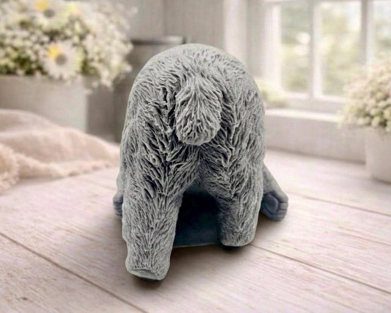 huge highly detailed polar bear shaped vegan bar soap, handmade and resting on a rustic wooden table with floral backdrop - ideal sustainable gift idea for animal lovers.