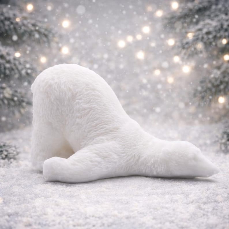 huge highly detailed polar bear shaped vegan bar soap, handmade and resting on a rustic wooden table with floral backdrop - ideal sustainable gift idea for animal lovers.