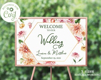 Peut inclure: Une pancarte d'accueil de mariage imprimable avec un cadre hexagonal doré et des motifs floraux. Le texte indique "Bienvenue à notre mariage Lauren & Matthew 19 septembre 2021".