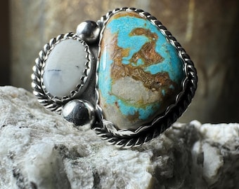 Size 8.5 Turquoise, White Buffalo and Sterling Silver ring.