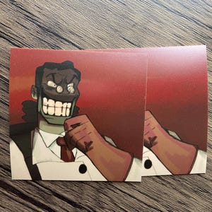 Peut inclure: Une illustration numérique d'un personnage de dessin animé portant une chemise blanche, une cravate rouge et un costume marron foncé. Le personnage a un large sourire avec de grandes dents blanches et un teint brun foncé. L'arrière-plan est un dégradé rouge.