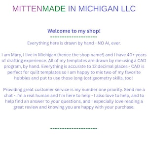 May include: A white informational sign with purple and green text that reads: MITTENMADE IN MICHIGAN LLC, Welcome to my shop!, Everything here is drawn by hand - NO AI, ever. I am Mary, I live in Michigan and I have 40+ years of drafting experience.
