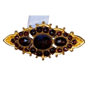 Vintage Gold-Tone Brooch &quot;ART&quot; With Red Glass Gemstones