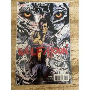 May include: A comic book cover for "Wolf Moon" features a man holding a gun, set against a backdrop of a wolf's face. The title is in large red letters. The Vertigo logo is at the top.