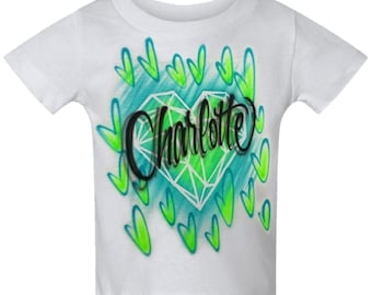 Diseño de nombre personalizado con corazón de diamante escrito con aerógrafo