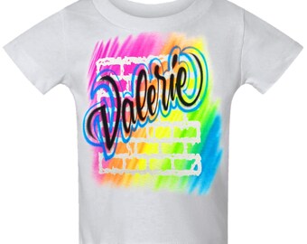 Diseño de nombre personalizado con ladrillos de arcoíris escritos con aerógrafo