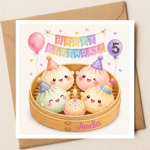 May include: A square birthday greeting card featuring a bamboo steamer filled with four smiling, colourful dumplings wearing party hats and a small cupcake with a lit candle. Above, a banner reads HAPPY BIRTHDAY with a pink balloon and a purple balloon with the number 5. The name Amelia is printed in pink on the front of the steamer.