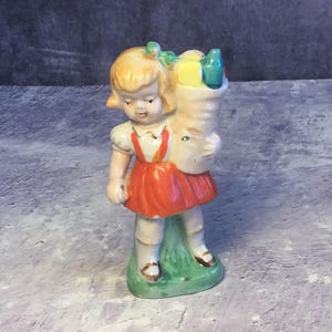 Vintage Porcelain Girl With Paper Shopping Bag Figurine, Mid Century Handpainted Girl Ornament Knick Knack