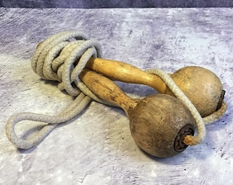 Vintage Wooden Skipping Rope: Rustic Antique Sporting Goods with Metal Ball Bearing Rotation