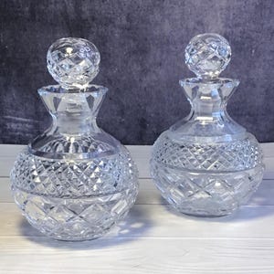 A Pair of Beautiful Vintage Cut Glass Perfume Bottles With Stoppers