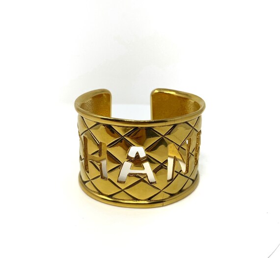 Chanel gold bangle with authenticity card, Chanel