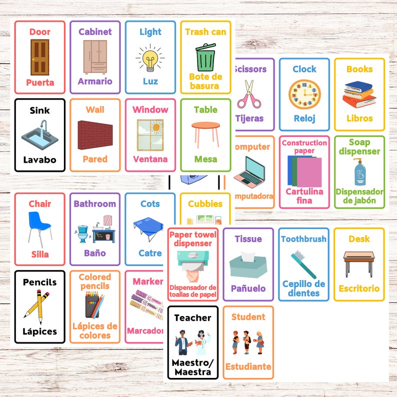 May include: Colorful flashcards with illustrations and Spanish and English words for classroom objects. The cards feature a door, cabinet, light, trash can, scissors, clock, books, sink, wall, window, table, chair, bathroom, cot, cubbies, paper towel dispenser, tissue, toothbrush, desk, pencils, colored pencils, marker, teacher, and student.