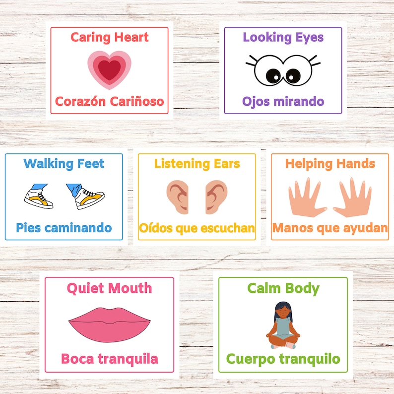 May include: Colorful cards with illustrations of body parts and Spanish and English phrases. The cards include a heart, eyes, feet, ears, hands, mouth, and a person meditating. The phrases include "Caring Heart", "Looking Eyes", "Walking Feet", "Listening Ears", "Helping Hands", "Quiet Mouth", and "Calm Body".