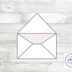 May include: A white envelope with a gray flap. The envelope is on a white wood background.