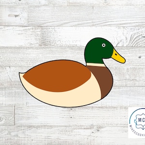 Tagliabiscotti a forma di anatra seduta