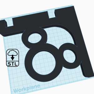 May include: A black 3D printed shelf bracket with two circular cutouts. The bracket is designed to be mounted to a wall or other surface. STL file download icon is visible in the image.