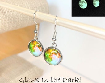 Glow In The Dark Earrings Glowing Jewelry Round Drop Earrings Silver .5 Inch Dangle Earrings with Crystal Ball Graphic Glows in the Dark