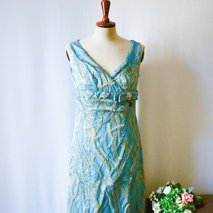 Evening dress, 70s with rhinestone brooch, True Vintage