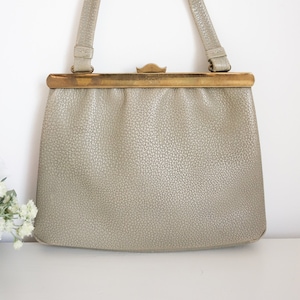 grey handle bag, 50s