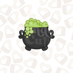 May include: A black cauldron with green bubbling liquid inside. The cauldron has three legs and two handles. The background is a white pattern of hearts.