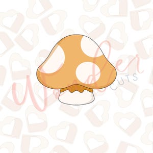 May include: A mushroom-shaped cookie cutter with a rounded cap in shades of orange and white, featuring three white spots. The stem is white with a textured, ruffled edge. The cutter is designed for baking and crafting.