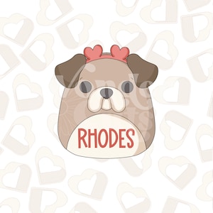 May include: A brown and white cartoon dog with a pink headband and antlers. The dog is holding a white circle with the word "RHODES" written in red.