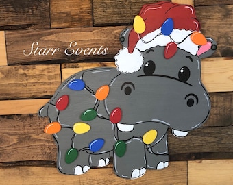 Christmas hippopotamuse door hanger. Christmas door hangers. Christmas decor. Christmas decorations. I want a hippopotamus for Christmas.