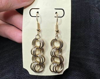 Gouden en zilveren ring bungelen oorbel