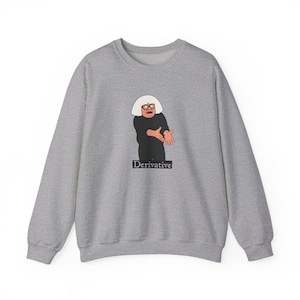 May include: A heather grey crewneck sweatshirt featuring a cartoon illustration of a person with white hair and glasses wearing a black shirt. The person has their hands outstretched in a gesture, and the word Derivative is printed below in black.