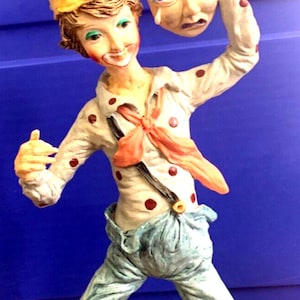Duncan Royale CLOWN with Mask in his hand 11.75” Tall with Base